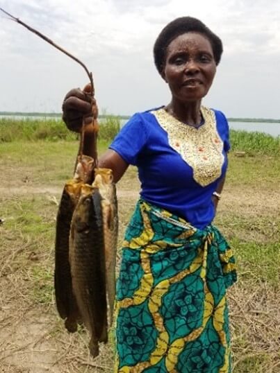 Mrs Mnzuka and fish Mrs Mnzuka and fish