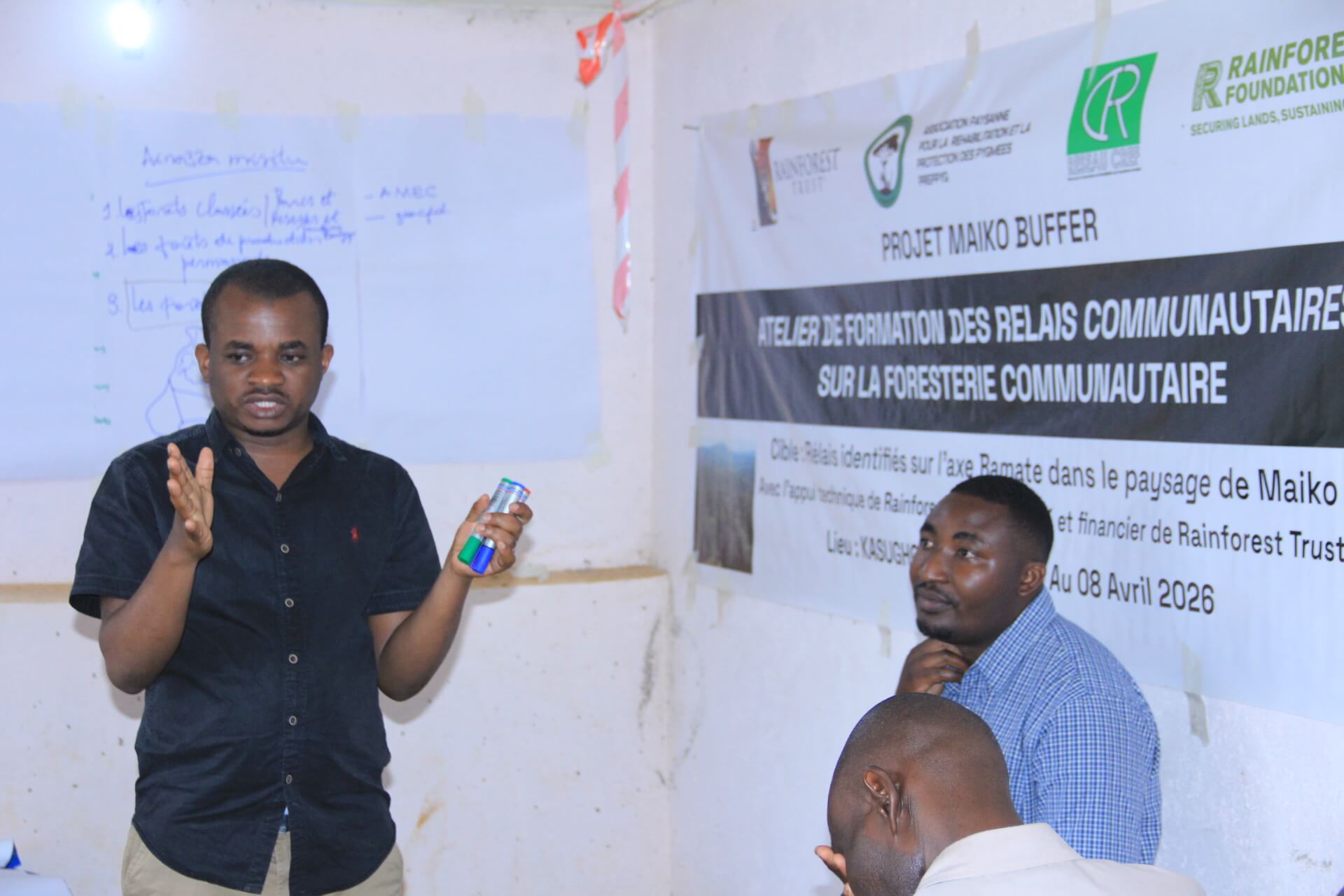 A PREPPYG team member provides training to Masombea community members.